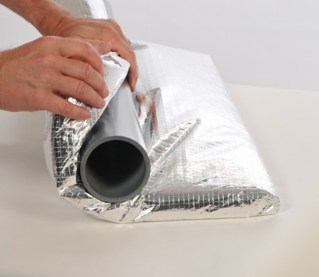 Step 2: Wrap material around pipe.